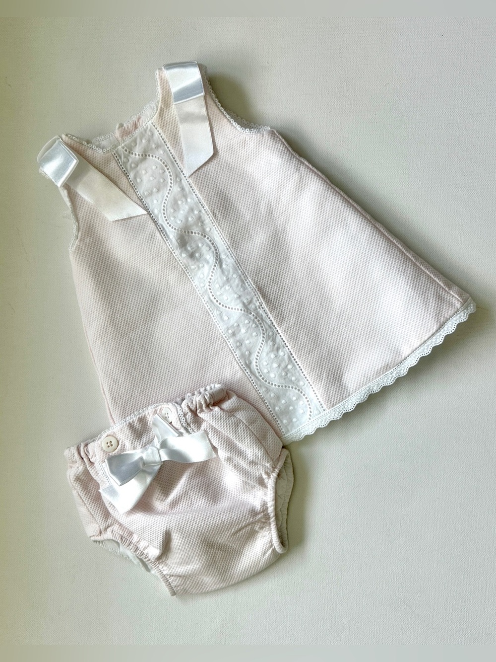 Dulces girl’s pique dress is classic Spanish-style heirloom garment.  Size 0-3M.